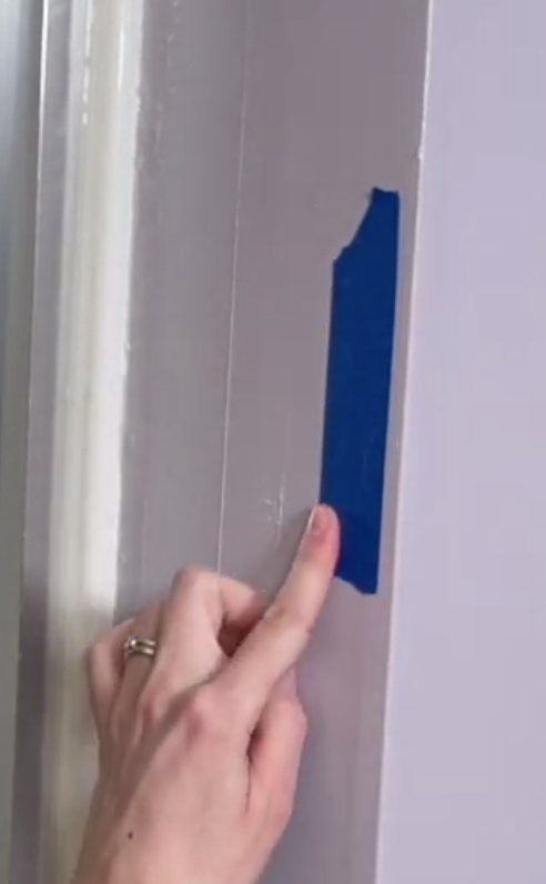 Mark stud location with painter's tape - How to Install a Grab Bar