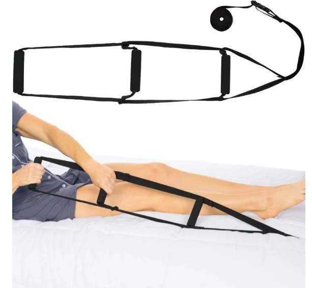 A bed ladder aid, a tool designed to help individuals sit up in bed. The inset at the top displays the bed ladder as a long, black strap with loops and a handle at one end. The main picture illustrates a person in bed using the ladder: we see only their lower half, with legs extended and hands gripping one of the ladder loops. The ladder is laid out on the bed, stretched towards the foot of the bed, providing leverage for the person to pull themselves up.