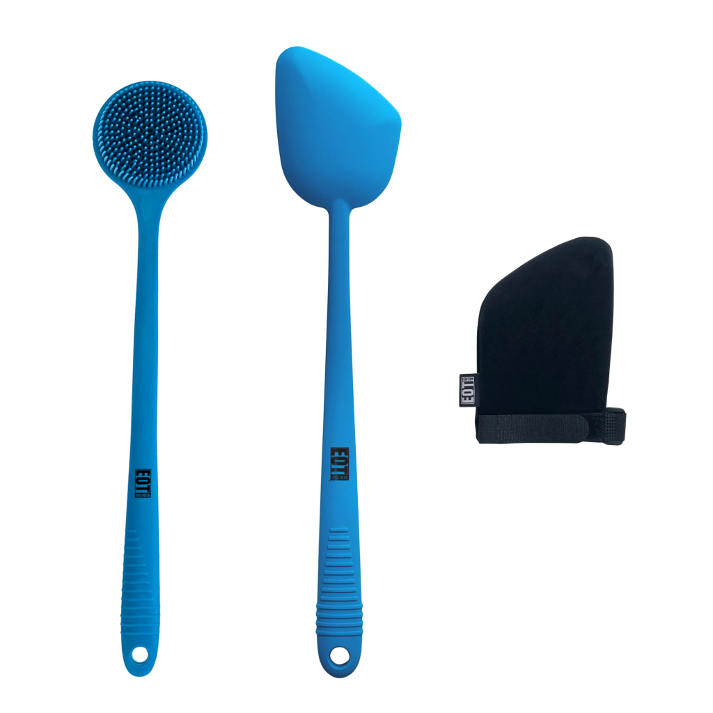 EOT Wellness blue silicone body scrubber and lotion applicator with ergonomic handles, accompanied by a black mitt.